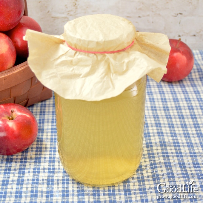 jar of apple vinegar on a table