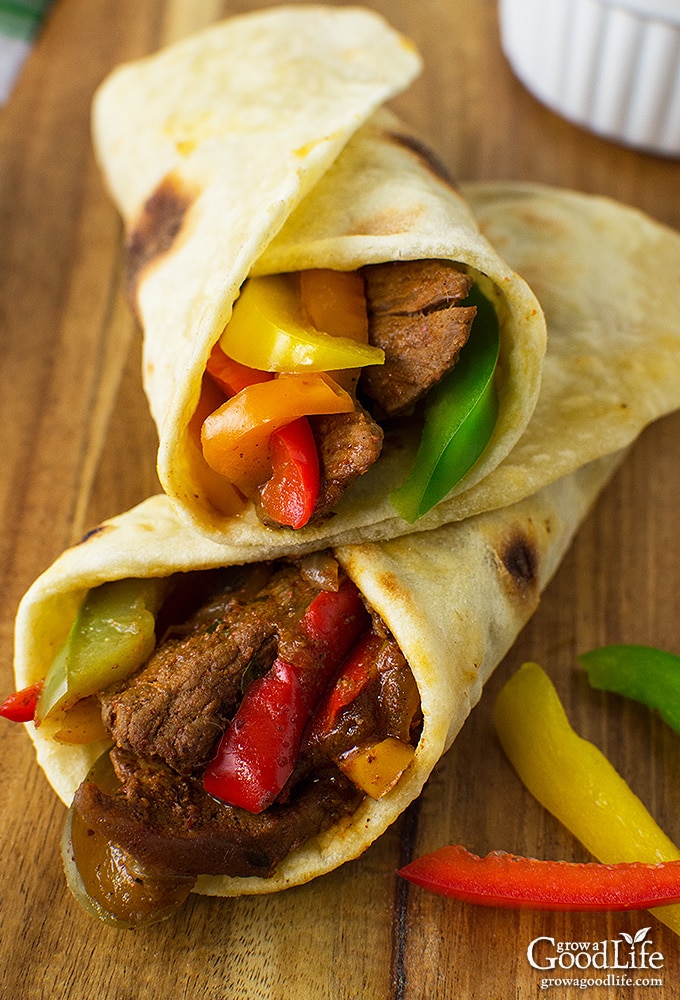 These sizzling beef steak fajitas are made with strips of steak infused with a flavorful chili-lime marinade, combined with colorful peppers, onions, and folded into a warm tortilla.