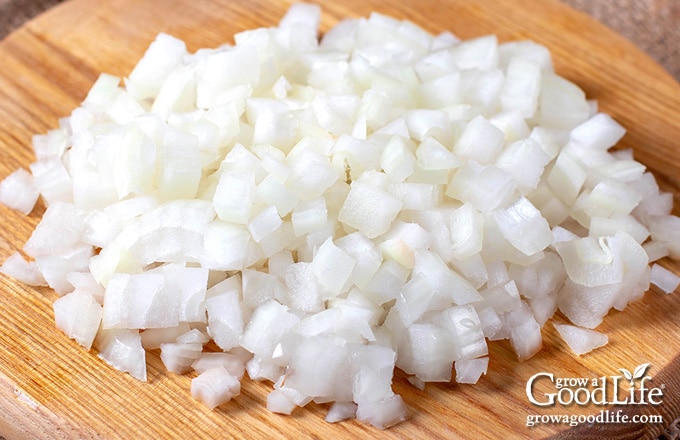 chopped onions on a cutting board