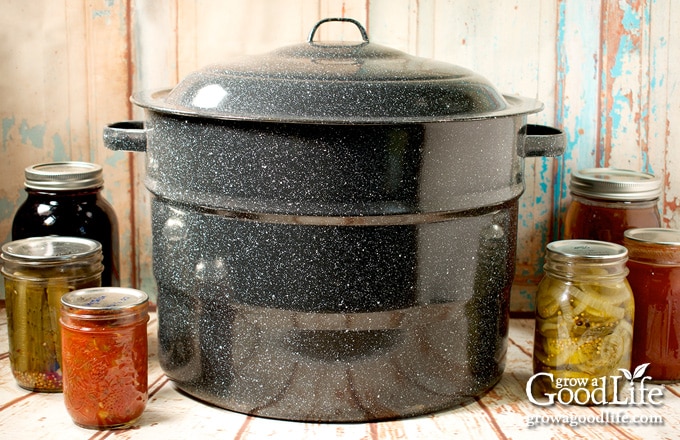 water bath canner and jars on a table