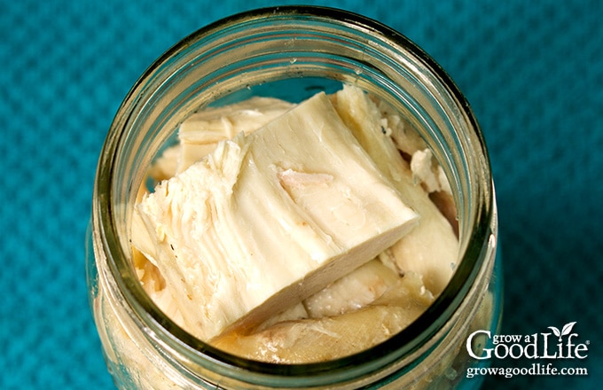 overhead image of turkey meat in a jar