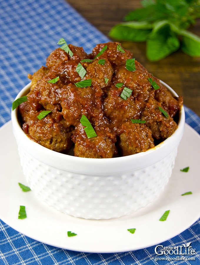 These Cocktail Meatballs with Cherry Barbecue Sauce are slightly sweet with a little bit of smoky heat kick you will love. An easy appetizer that is perfect for parties, game day, and potluck meals.