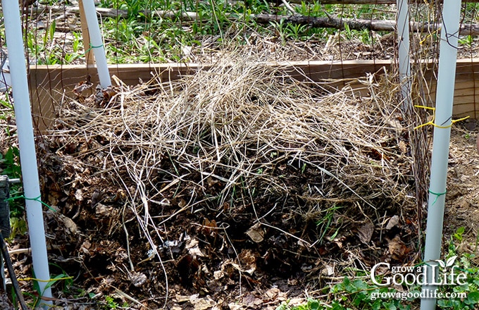 Layering the compost bin.