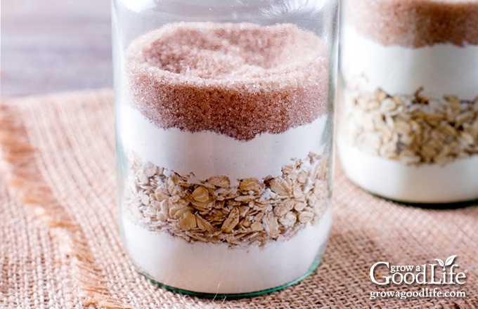 filling a jar with dry ingredient for cookies