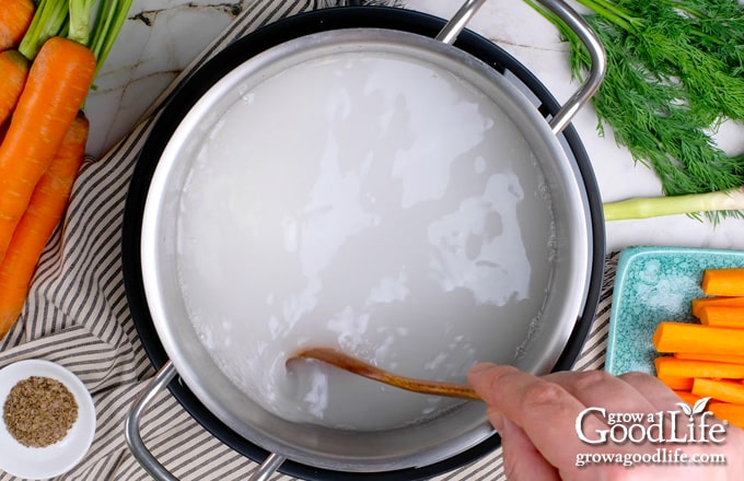 Over head view of a pot of pickling brine.