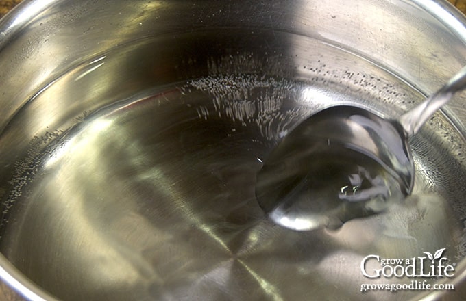 Over head view of pickling brine in a pot.