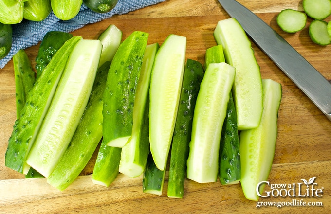 cucumber spears on a cutting board