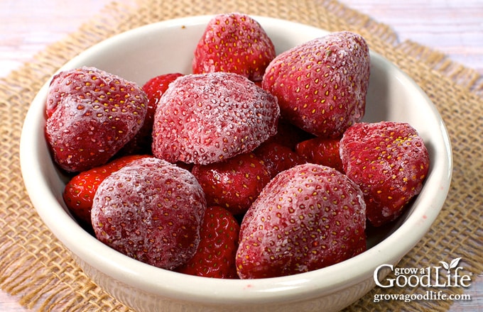 Frozen strawberries in a bowl.