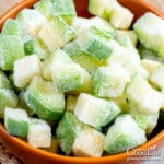 bowl of frozen zucchini pieces on a table