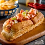 closeup of a Maine lobster roll in a toasted bun