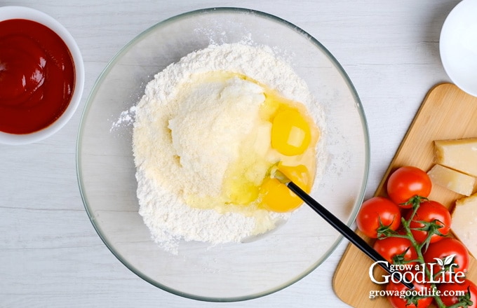 mixing the dough in a bowl