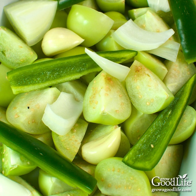 ingredients for salsa verde in a roasting pan