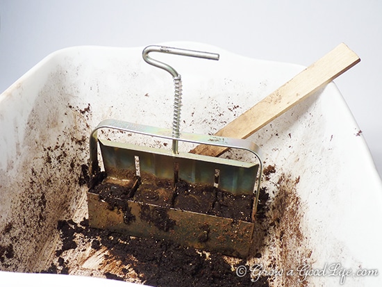 One of the benefits of using soil blocks to grow seedlings is it eliminates the need for plastic cell packs or peat pots. The soil block functions as both the container and the soil for starting and growing seedlings.