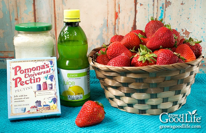 Ingredients for making homemade strawberry jam.