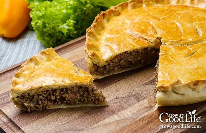 baked tourtiere on a table)