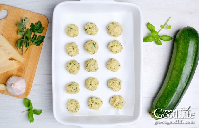 zucchini balls in a baking pan