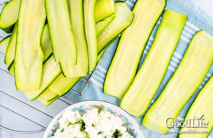 sliced zucchini strips on a towel